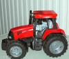 Bruder modell piros traktor gumi kerekekkel