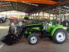 Mini farm traktor with front loader 4in1 bucket and backhoe,4cylinders,8F+2R shi,with Cabin,heater,fan,fork,blade
